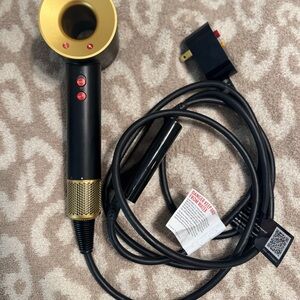 Dyson Hair Dryer in Black and Gold